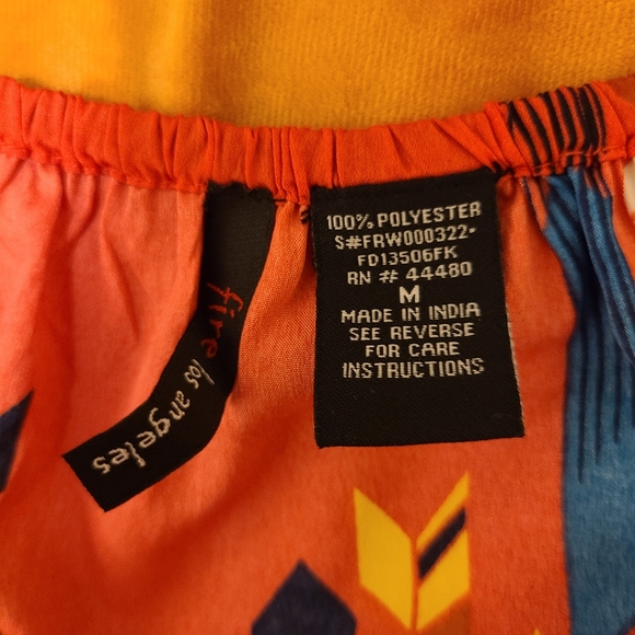 NWOT Fire Los Angeles pink and navy Romper - Picture 9 of 11